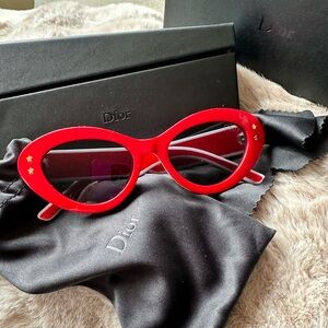Red sunglasses with star details
